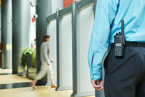 security guard with walkie talkie