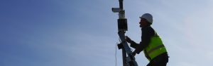 maintenance engineer inspecting cctv on site
